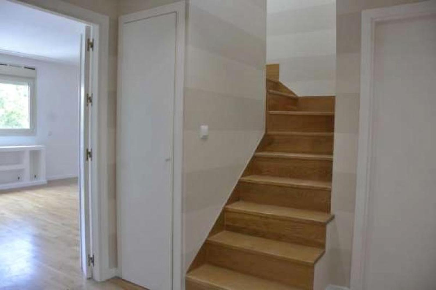 Hall y escalera ático